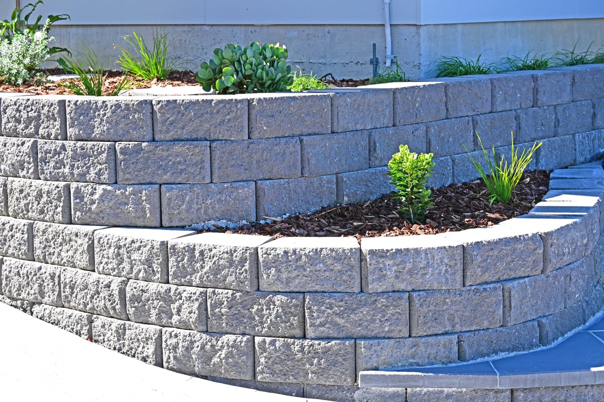 Erosion control retaining wall